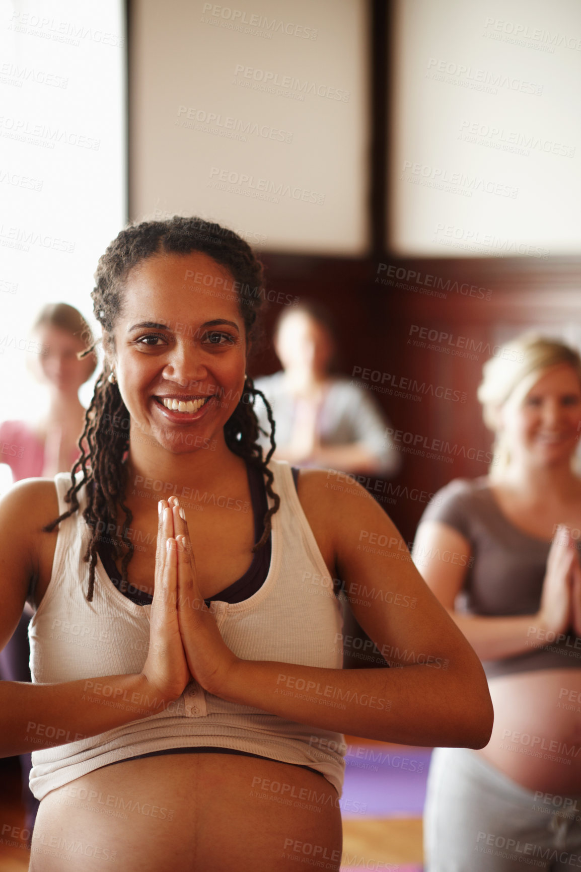 Buy stock photo Wellness, yoga and meditation of pregnant friends or women with spiritual, health and healthy lifestyle with prayer hands sign. Portrait of happy mother to be in yoga class with smile in a zen studio