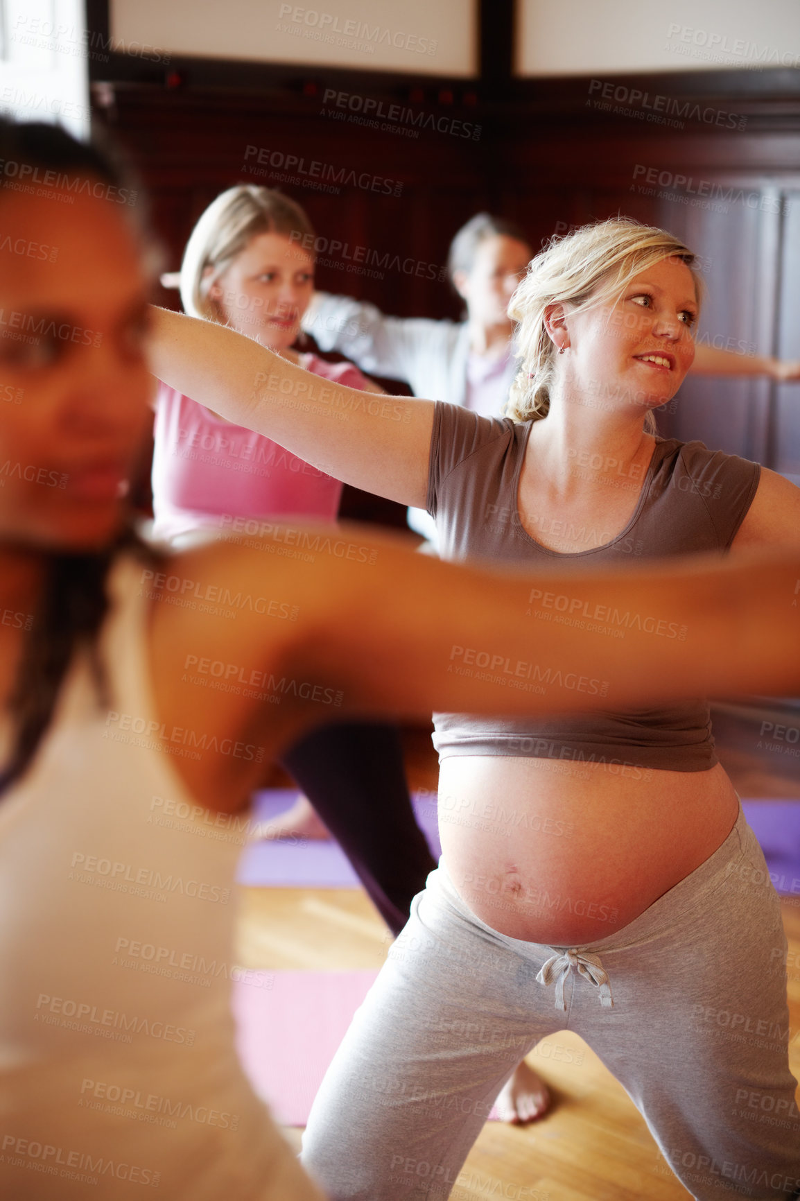 Buy stock photo Pregnant, yoga and woman doing pilates or health fitness exercise in a class workout studio. Pregnant woman or mother abdomen, doing cardio for pregnancy wellness or healthy motivation in yoga class