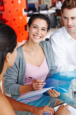 Buy stock photo Meeting, employees and writing notes in portrait, teamwork and planning schedule for office project. Business people, networking and minutes of brainstorming in workplace, collaboration and support