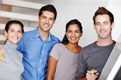 Buy stock photo Portrait of a successful design team smiling confidently