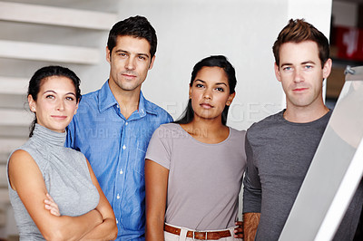 Buy stock photo A determined business team looking at you confidently