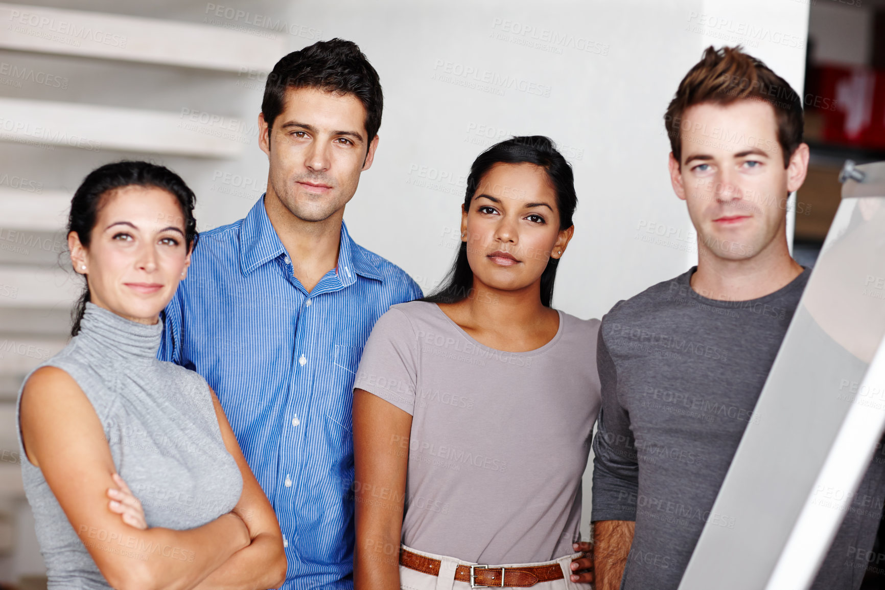 Buy stock photo A determined business team looking at you confidently