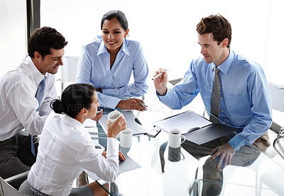 Buy stock photo A business team collaborating on a project in the boardroom