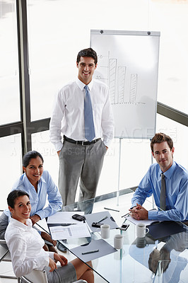 Buy stock photo Portrait of a group of successful businesspeople attending a presentation in the boardroom