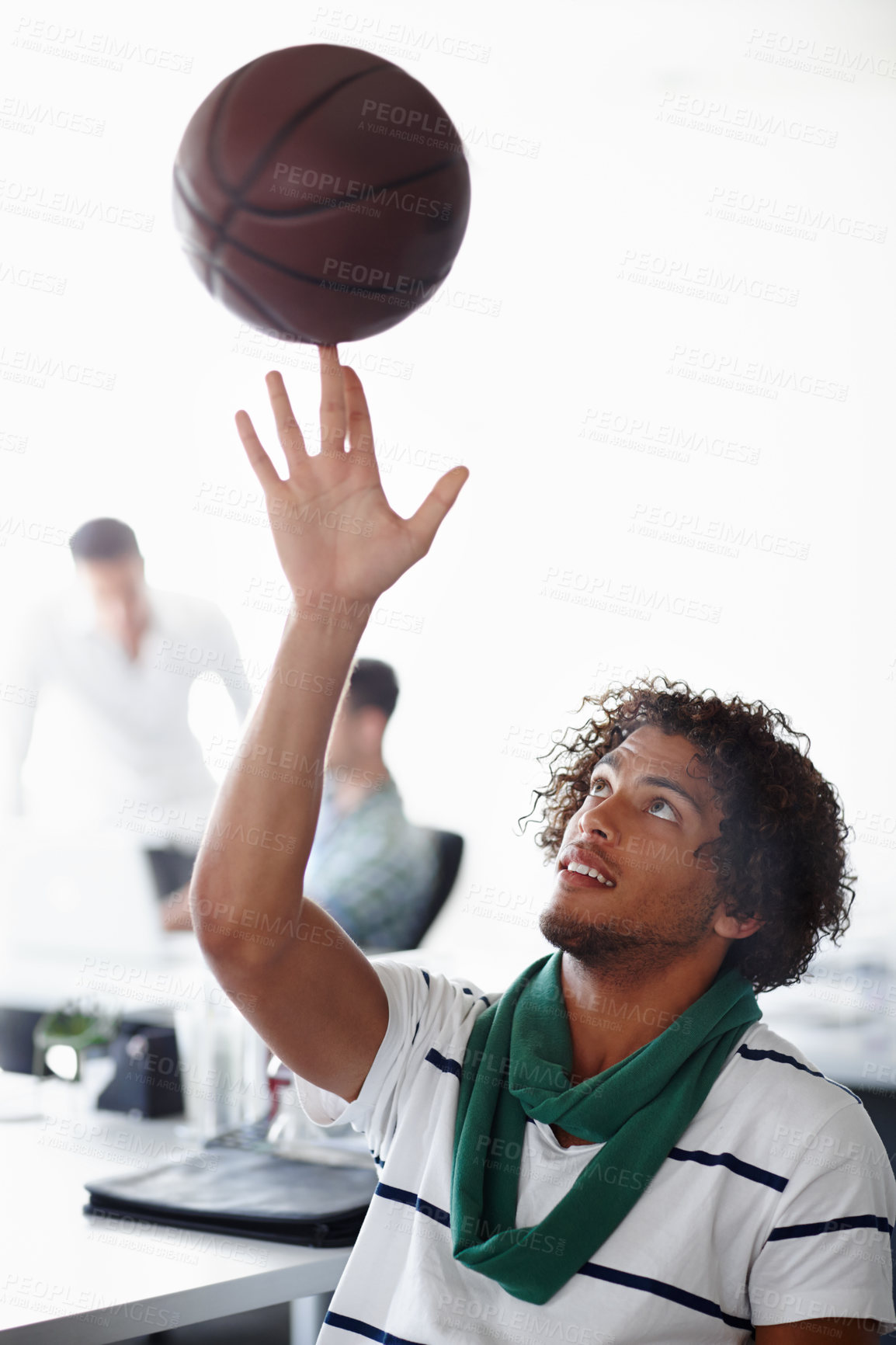 Buy stock photo Break, daydream and man in office with basketball for sports journalism or publishing job. Balance, skill and spinning with employee at desk in creative workplace for artistic or design career