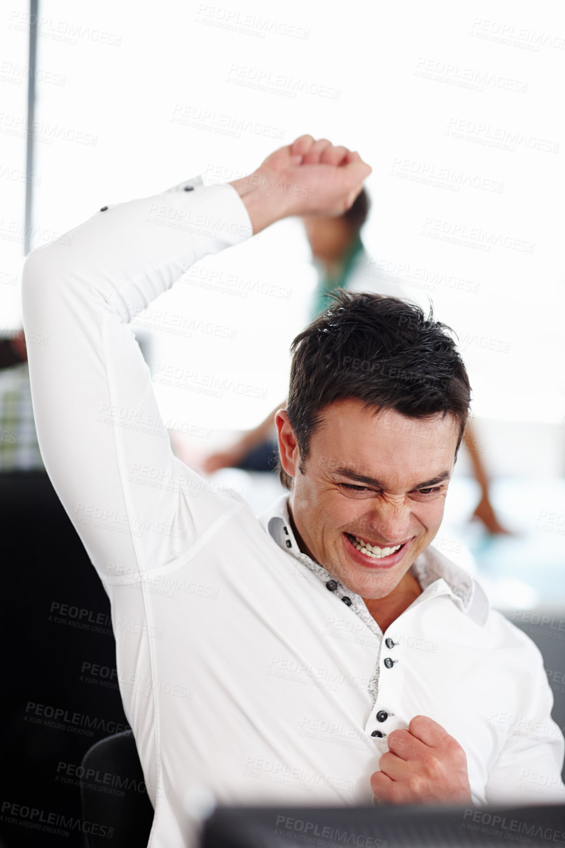 Buy stock photo Happy man, celebration and winning with fist pump for promotion, victory or raise at office. Excited male person or young employee with smile for good news, prize or deal of online offer at workplace