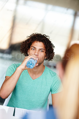 Buy stock photo Drinking, water and business man in office for meeting, planning and teamwork in workplace. Creative startup, professional and person with liquid for health, wellness and hydration at job or career