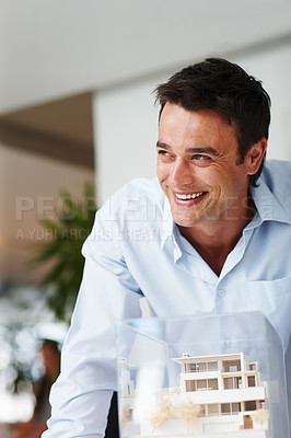 Buy stock photo A young male architect working in the office