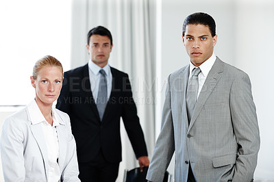 Buy stock photo A professional business team standing together in the office