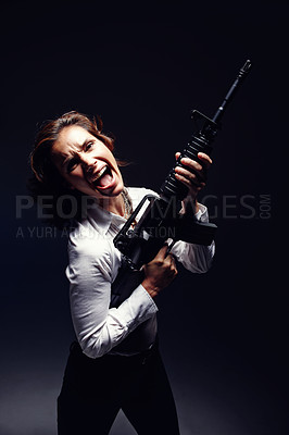Buy stock photo Woman, rifle and professional portrait in studio, angry corporate killer and black background. Female person, mafia boss and gun for fancy gangster business, criminal weapon and danger to security