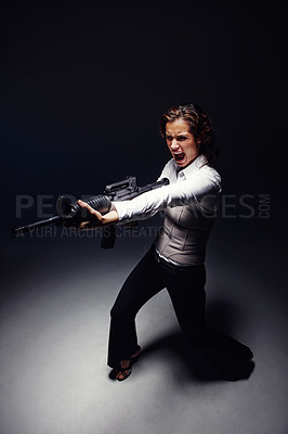 Buy stock photo Woman, rifle and professional agent in studio, angry corporate killer and black background. Female person, mafia boss and gun for fancy gangster business, criminal weapon and danger to security