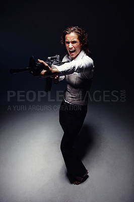 Buy stock photo Woman, rifle and professional spy in studio, angry corporate killer and fight on black background. Female person, mafia boss and gun for fancy gangster business, criminal agent and danger to security
