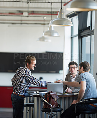 Buy stock photo Professional man, partner and handshake with team in office for meeting, creative and company startup. Men, collaboration and business deal in modern workspace for agency, strategy and design