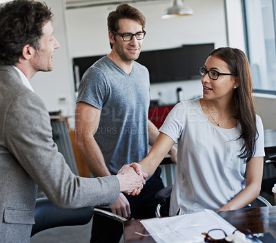Buy stock photo Happy, business people and handshake for agreement, partnership and collaboration in office workplace. Corporate ceo and employee shaking hands for b2b, recruitment or deal with boardroom background