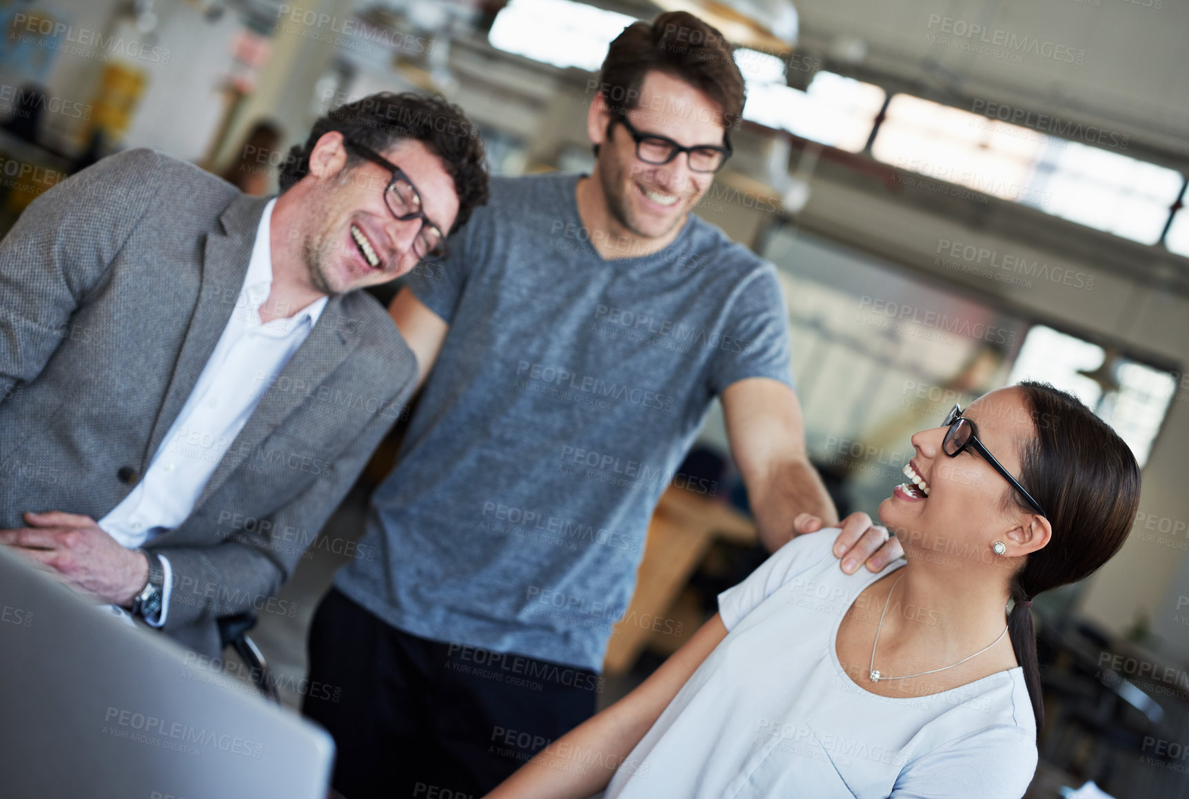 Buy stock photo Team, laptop and happiness in office with laughing, cheerful and joyful for company as colleagues. Businesspeople, group and employees in workplace, corporate and technology for meeting or teamwork