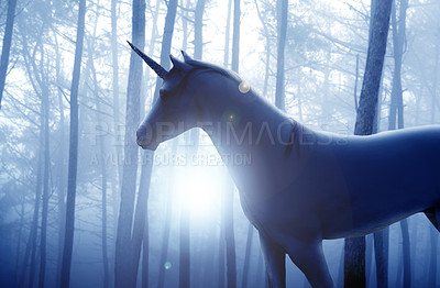 Buy stock photo Shot of a beautiful unicorn standing in a forest