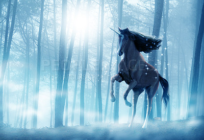 Buy stock photo Shot of a beautiful unicorn running through a mystical forest