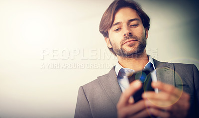 Buy stock photo Phone, typing and business man in city with lens flare for social media, online chat and connection. Professional, worker and person on cellphone for networking, communication and contact in morning