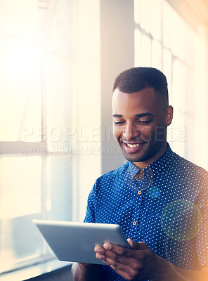 Buy stock photo African, man and tablet in office for chatting, research or work. Intern, trainee or entrepreneur with smart shirt and technology at company for small business, startup and careers in South Africa