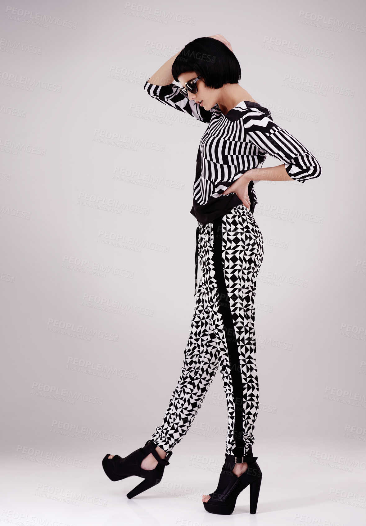 Buy stock photo Fashion, vintage or woman on grey background, trendy and stylish outfit in retro pants or high heels. Unique lady, full body or confident female model with edgy, classy clothes or style in studio