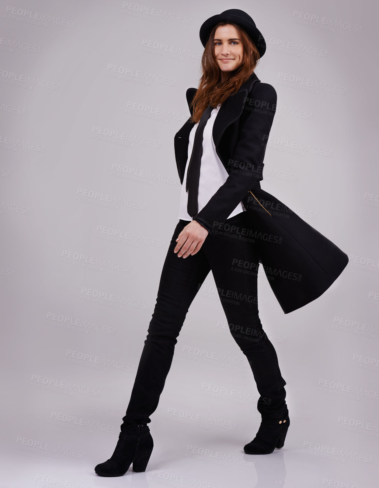 Buy stock photo Fashion, woman and suit with hat in studio for gender neutral, y2k and edgy with designer brands. Confident, vintage and elegance by white background for style inspo, minimalist and funky apparel