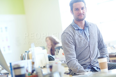 Buy stock photo Portrait, man and graphic designer with sitting on desk for creative career, lens flare and startup. Summer, morning and face of teacher in staff room with school, beverage and education for children