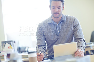 Buy stock photo Corporate, office and businessman with tablet at desk for company proposal, research and planning. Administration, technology and man with pen for portfolio review, problem solving or feedback report