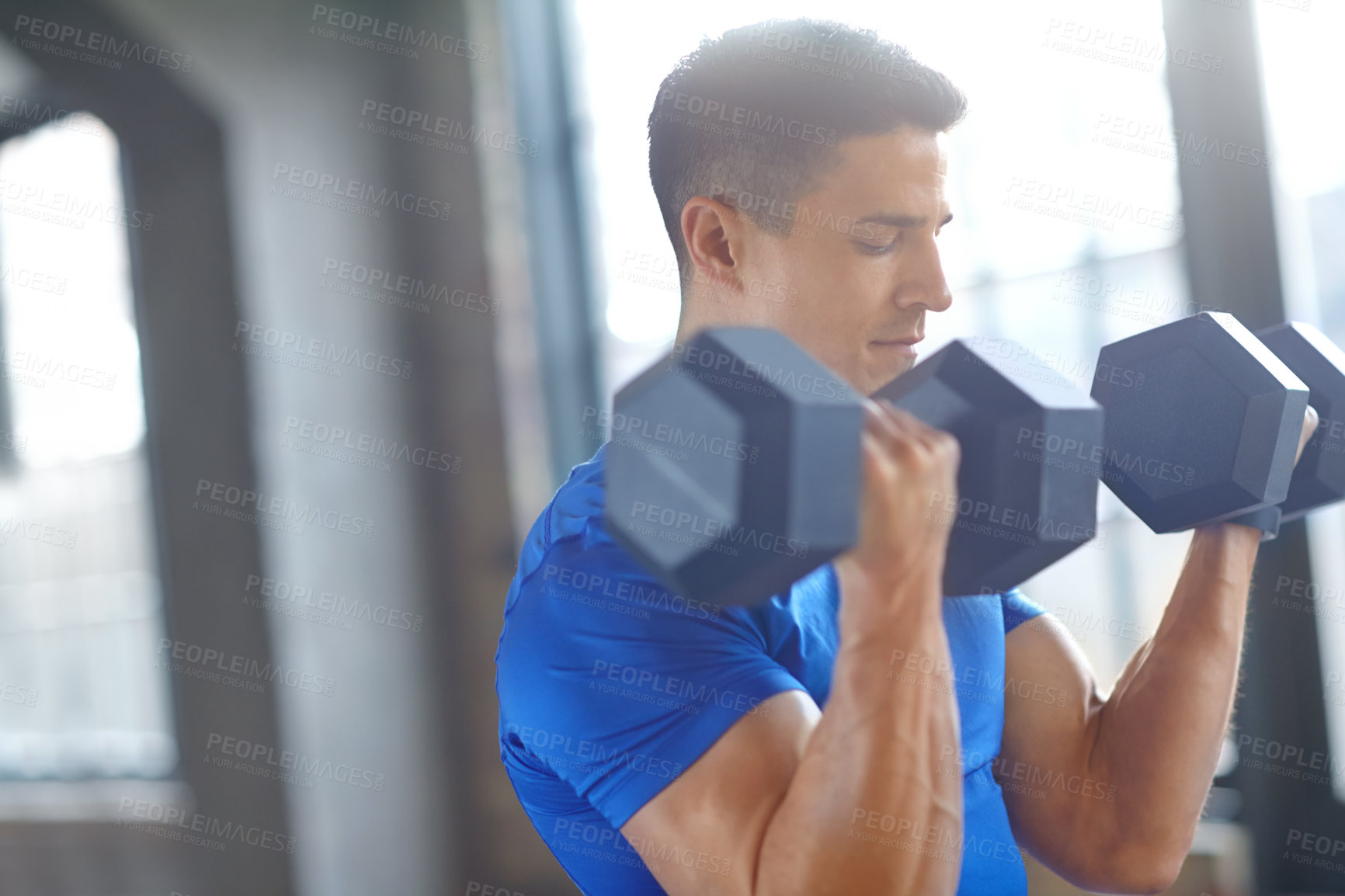 Buy stock photo Heavy, bodybuilder or man with dumbbells in training, workout or exercise for grip strength. Lift, bodybuilding or strong athlete with weights for pump, sports challenge or energy for fitness in gym