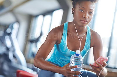 Buy stock photo Portrait, water and black woman streaming music, bottle and fitness with progress, exercise and healthy. Face, African person and athlete with hydration and song with smartphone, radio and wellness