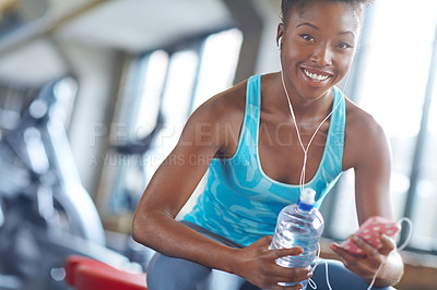 Buy stock photo Portrait, black woman and streaming audio, water bottle and fitness with workout and resting after training. Face, African person and athlete with hydration and song for exercise, audio and relax