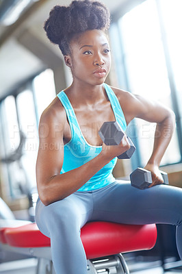 Buy stock photo Black woman, weightlifting and bench for dumbbell exercise or bicep curl for muscle, weight loss or fitness. Female person, equipment and strength training at gym club for health, arms or challenge