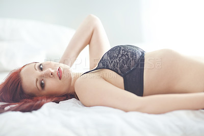 Buy stock photo Lingerie, serious and portrait of woman on bed with seductive, fashion or sexy style at home. Alluring, confidence and female person with underwear for sensual clothes, glamour or temptation in house