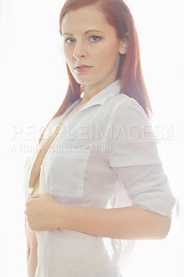 Buy stock photo Woman, shirt and sexy or seductive portrait for temptation, flirty and sensual in bedroom with confidence. Girl, teasing and serious in home for desire or sensuality, alluring and hot with cleavage.