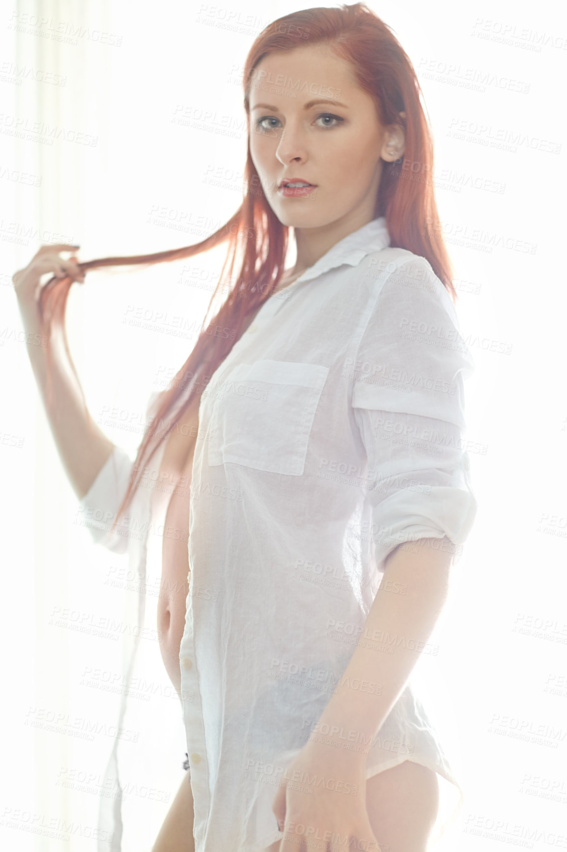 Buy stock photo Woman, shirt and sexy or seductive portrait for temptation, flirty and sensual in bedroom with confidence. Girl, teasing and serious in home for desire or sensuality, alluring and hot with cleavage.