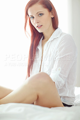 Buy stock photo Sexy, shirt and portrait of woman on bed for sensual style, confidence and temptation at home. Serious, relax and ginger person with pride in morning for alluring outfit, luxury fashion and clothes