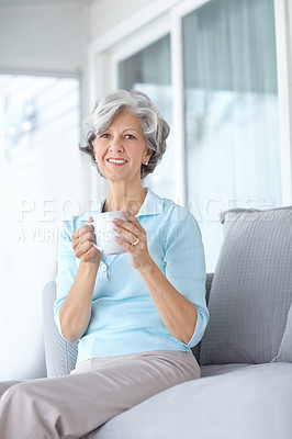 Buy stock photo Senior woman, portrait and espresso in home on weekend, satisfaction and confident for peace or calm. Female person, drinking tea and smile in retirement, wellness and relax in apartment for health