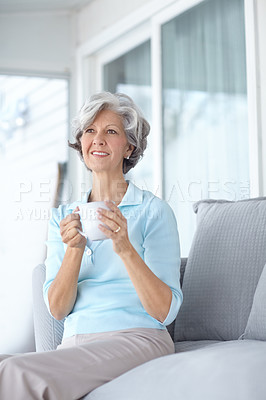 Buy stock photo Senior woman, thinking and tea in home on weekend, inspiration and confident for peace or calm. Female person, drinking coffee and relax in retirement, wellness and happy in apartment for wellness