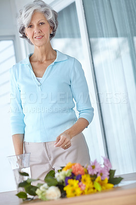 Buy stock photo Senior woman, vase and flowers in house with thinking, decision and natural decoration in morning. Mature person, happy and style with floral bouquet, memory or glass container in home for retirement