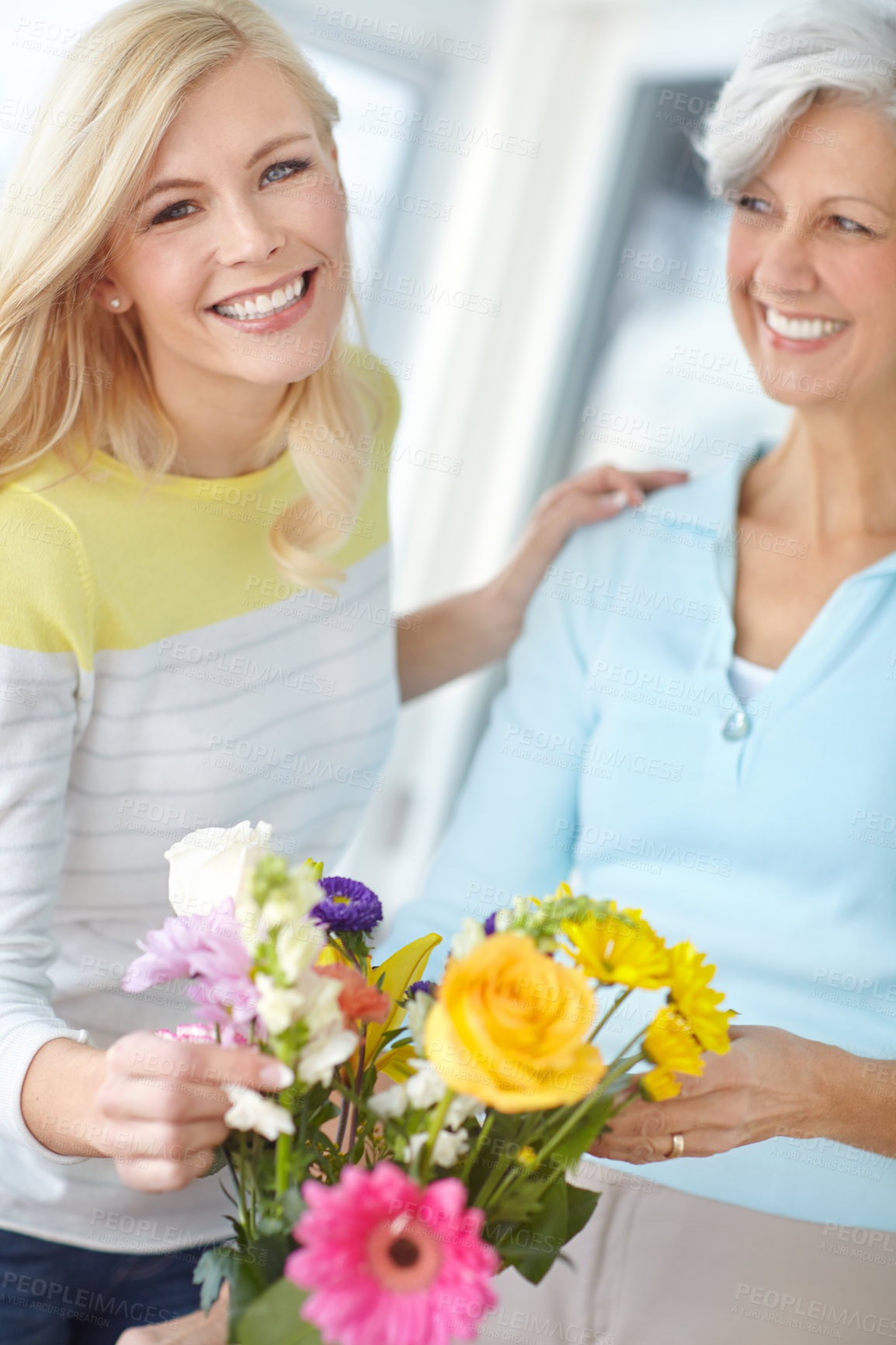Buy stock photo Present, mom and happy woman with flowers in portrait together with love, pride or wellness for gardening. Mothers day, mature lady or daughter bonding in family house with parent, plants or gift
