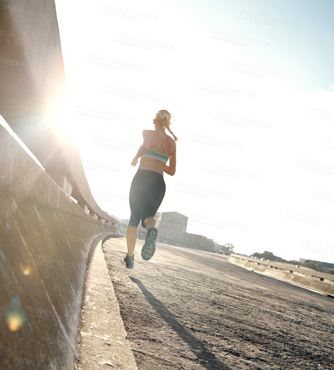 Buy stock photo Fitness, running and back of woman on bridge for race, marathon or endurance training. Sports, health and female athlete runner with cardio workout by highway for outdoor wellness exercise with speed