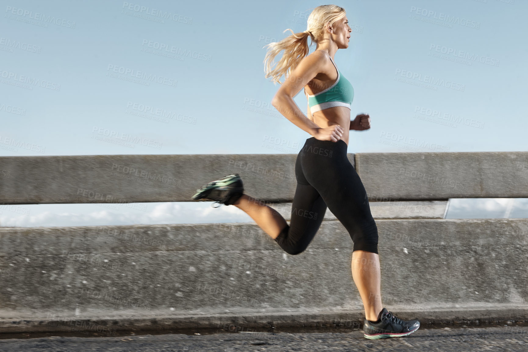 Buy stock photo Fitness, challenge and woman on bridge for running with race, marathon or endurance training. Sports, health and female athlete runner with cardio workout for speed by highway for outdoor exercise.