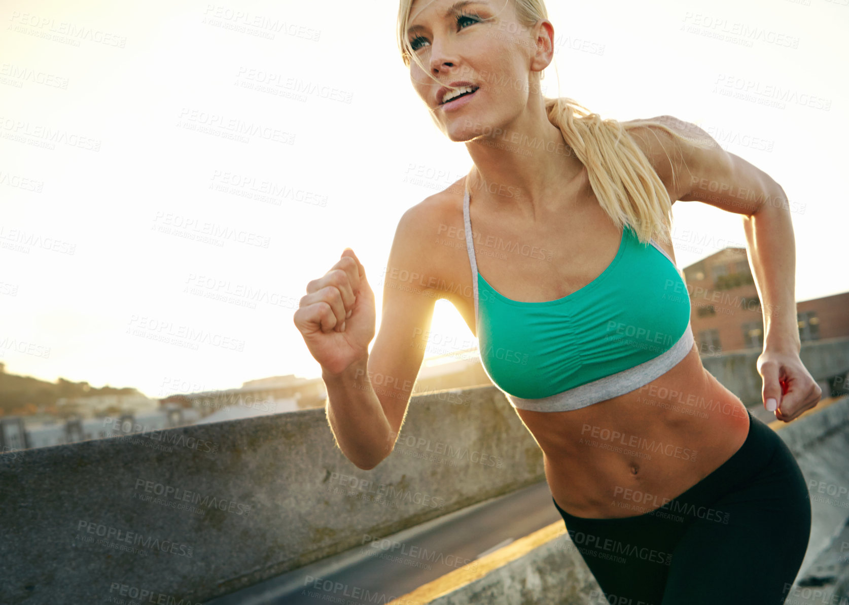 Buy stock photo Sports, athlete or happy woman running in city for exercise, training or fitness workout with smile. Race, girl runner or healthy female person on road for cardio endurance, wellness or activity