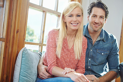 Buy stock photo Shot of a happy couple enjoying a leisurely day at home together