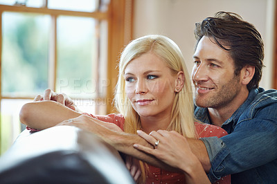 Buy stock photo Happy, couple and hug on sofa for support, time and bonding together at home for marriage and trust. Smile, man and woman with love embrace on couch with vision for  relationship, growth and relax