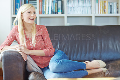 Buy stock photo Woman, thinking and relax on couch at house in living room for idea, memory or wondering choice of books for reading on weekend. Happy, female person and peace gratitude on sofa for vacation break


