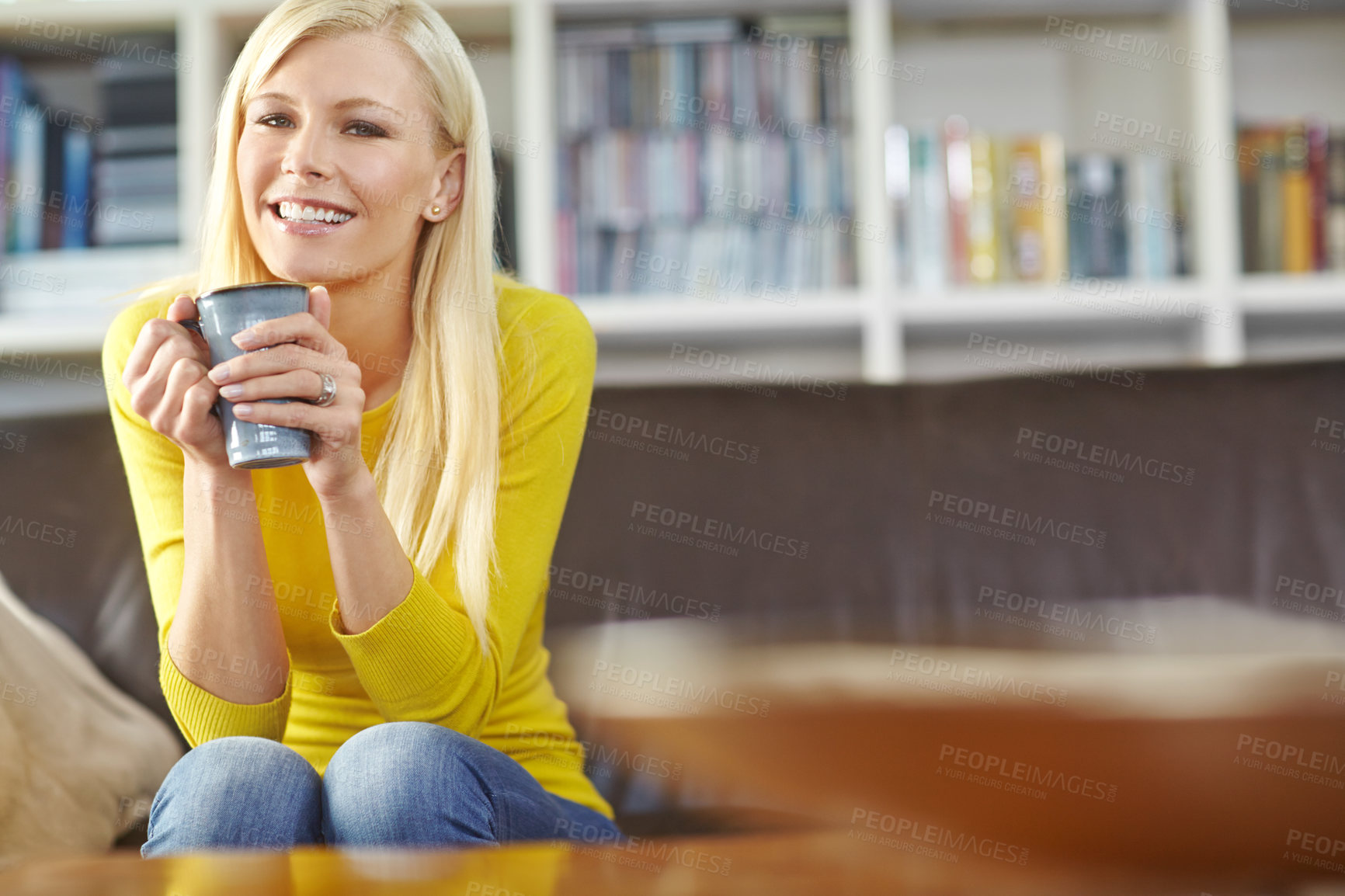 Buy stock photo Thinking, home and woman with coffee, portrait and happiness sitting on couch, weekend break and latte in living room. Apartment, person and girl on sofa, morning tea and ideas with espresso or smile
