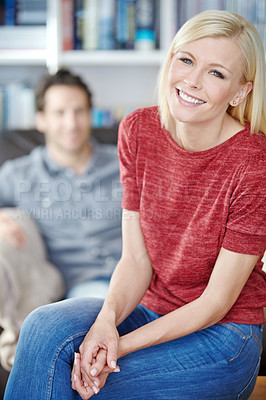 Buy stock photo Woman, relax and happy portrait in house, living room and smiling for weekend break in apartment or holiday home. Couple, calm vacation and together in lounge, partner and relationship bonding