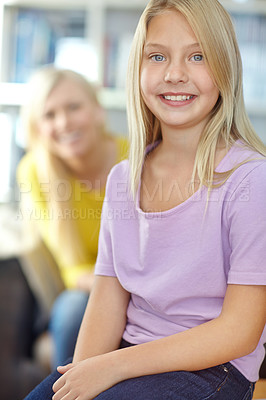 Buy stock photo Portrait, home and mother with girl, smile and bonding together with happiness, relax and peace. Face, single parent and joyful family with mama, daughter and kid in living room, calm and childhood