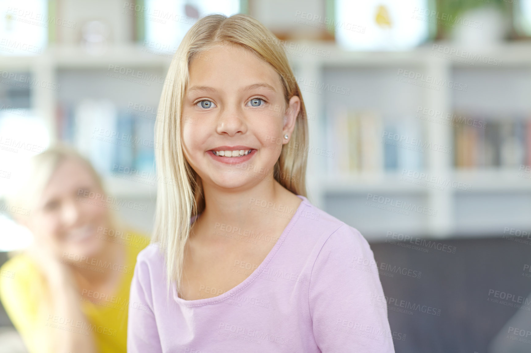 Buy stock photo Child, portrait and smile in home with mother for relaxing bonding or weekend, development or family. Daughter, woman and happiness as elementary student in apartment together, living room or youth