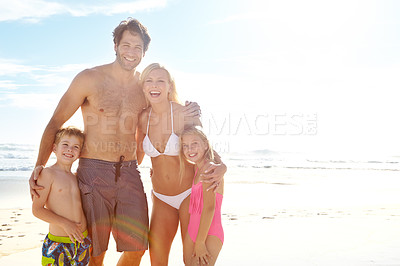 Buy stock photo Portrait, beach and happy family on holiday together for summer vacation, travel and mockup space. Mother, father and kids at ocean for adventure, support and funny parents laughing with children